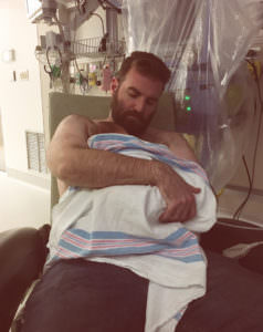 New father holds baby New father holds son.